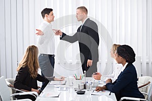 Businessman Blaming His Colleague In Meeting