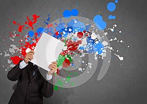 Businessman with blank book and splash colors choice