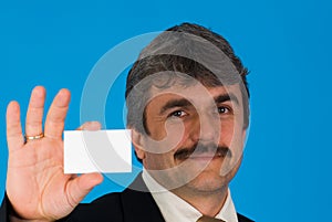 Businessman with blank card