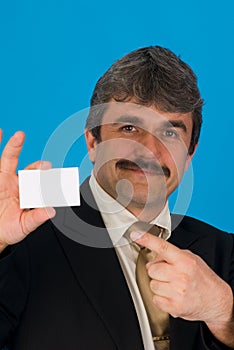 Businessman with blank card