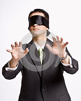 Businessman in blindfold photo