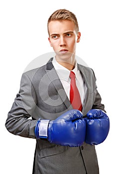 Businessman with blue boxing gloves