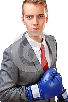 Businessman with blue boxing gloves