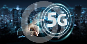Businessman using 5G network interface 3D rendering