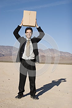 Businessman with a box