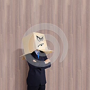 Businessman with box on head