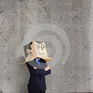 Businessman with box on head