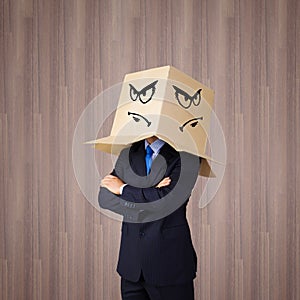 Businessman with box on head