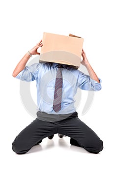 Businessman with box head