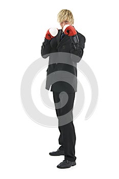 Businessman with boxing glove. photo
