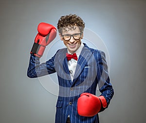 Businessman in boxing gloves