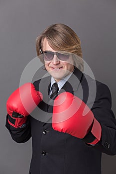 Businessman in boxing gloves