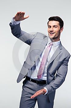 Businessman bragging about the size of something photo