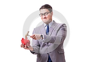 The businessman breaking piggybank isolated white background