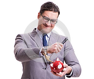 Businessman breaking piggybank isolated white background