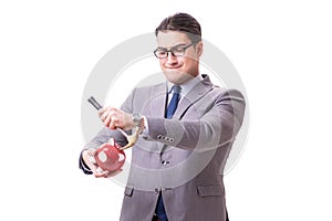 The businessman breaking piggybank isolated white background