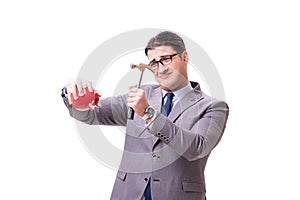 The businessman breaking piggybank isolated white background