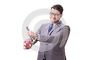 The businessman breaking piggybank isolated white background