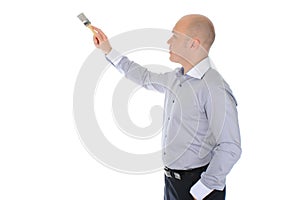 Businessman with a brush in his hand