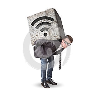 Businessman burdened by a heavy stone with a wifi icon on his back
