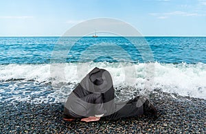 Businessman burying his head in the ground