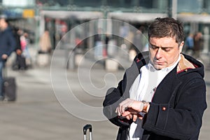 Businessman at the bus station