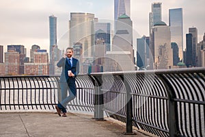 Businessman at business district in NYC. Portrait of business man in New York city. Success in America. Mature office