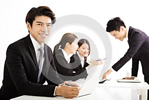 Businessman with business people having meeting together