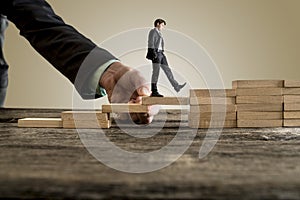 Businessman in business suit walking up steps