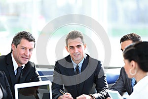 Businessman and business team working with documents