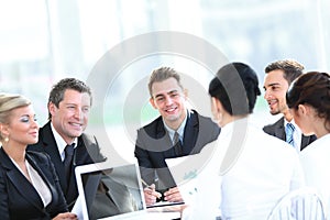 Businessman and business team working with documents