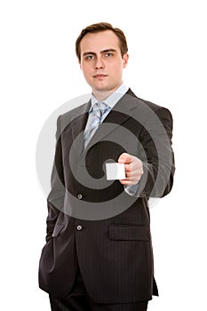 Businessman with businesscard. Isolated on white.