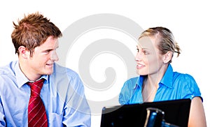 Businessman and businesswoman interacting