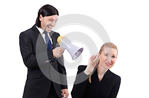 Businessman and businesswoman with megaphone
