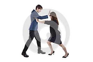 Businessman and Businesswoman pushing each other away