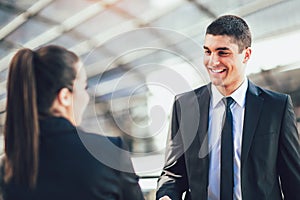 Businessman And Businesswomen Shaking Hands