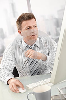 Businessman busy working in office