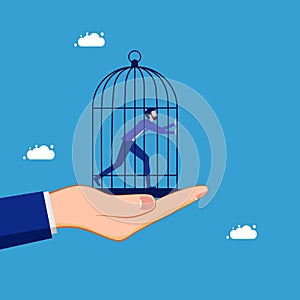 Businessman in the cage of authority. Imprisonment or lack of freedom of choice. business concept
