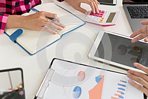 Businessman calculate about cost and doing finance at office