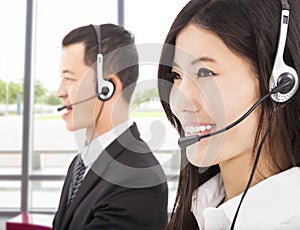 Businessman with call center agent