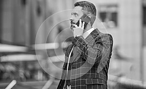 businessman call on phone outside, copy space. communication businessman call on phone and talk. businessman has phone