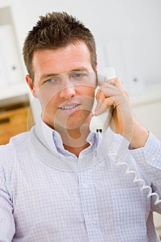 Businessman calling on phone