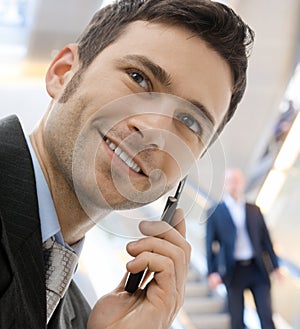 Businessman calling on phone