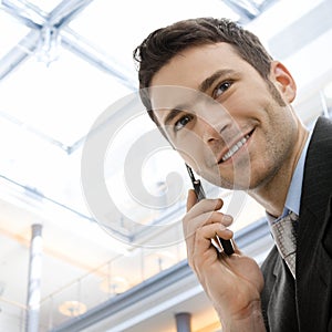 Businessman calling on phone