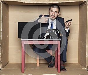Businessman can not handle a mobile phone