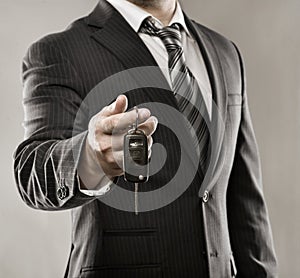 Businessman with car key