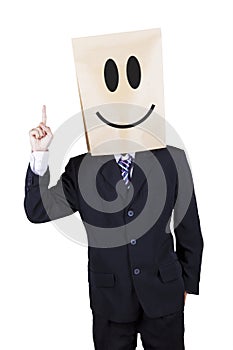 Businessman with cardboard head having idea