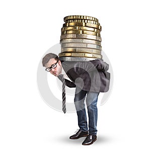 Businessman carrying a giant stack of coins on his back