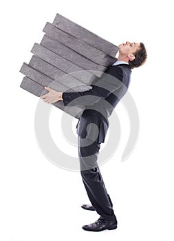 Businessman carrying high burden