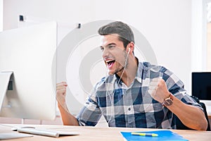 Businessman in casual cloth celebrating his success